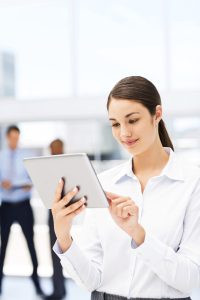 Female Executive Using Digital Tablet